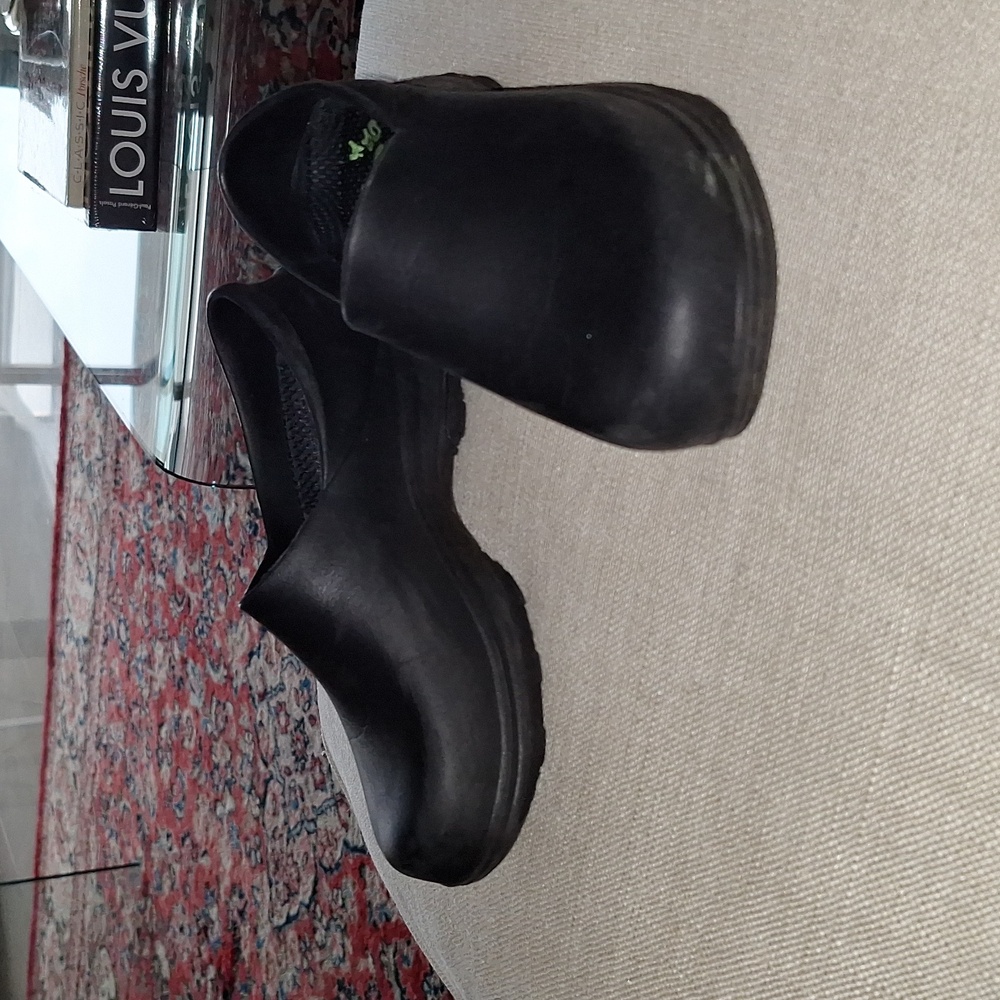 Black rubber clogs